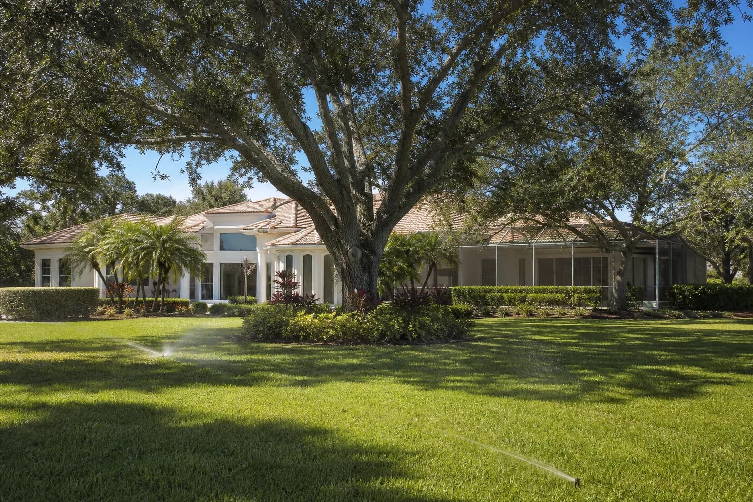 Davie Florida home with large windows and landscaping