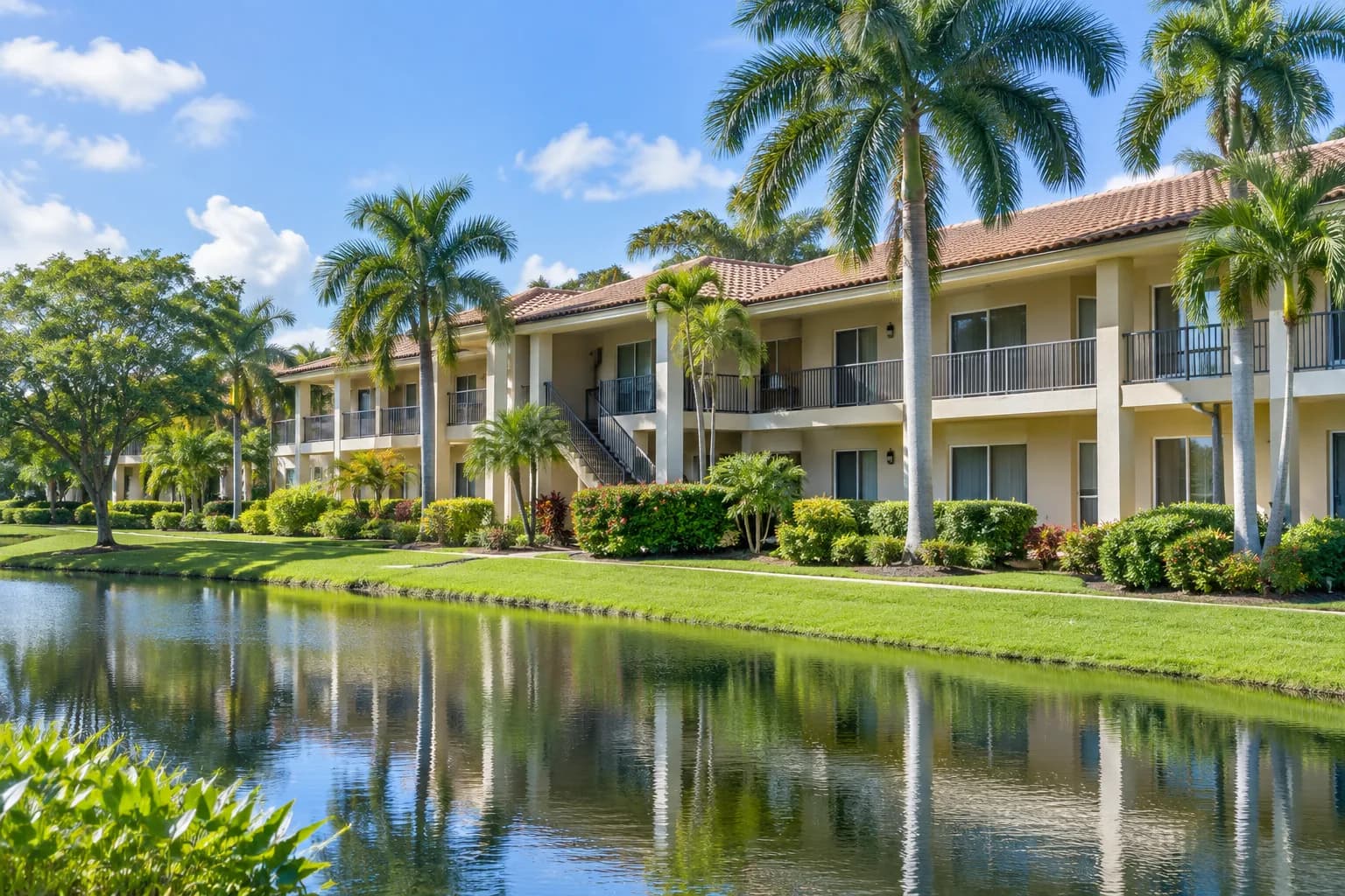 A garden-style condo building in Lauderdale Lakes with clean windows