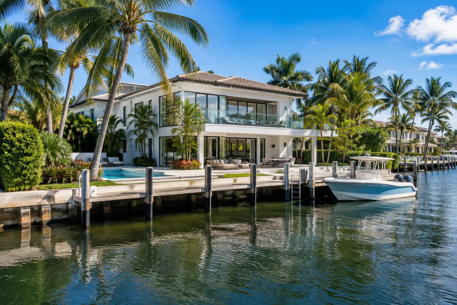 A waterfront home in North Miami with a dock and clean glass