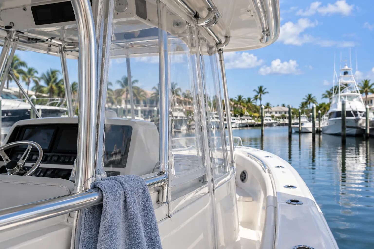 Clear vinyl enclosure panels on a center console boat, clean and bright